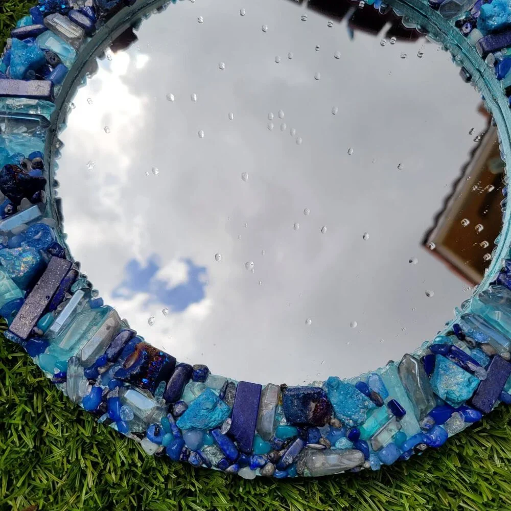 Mirror round with blue crystals